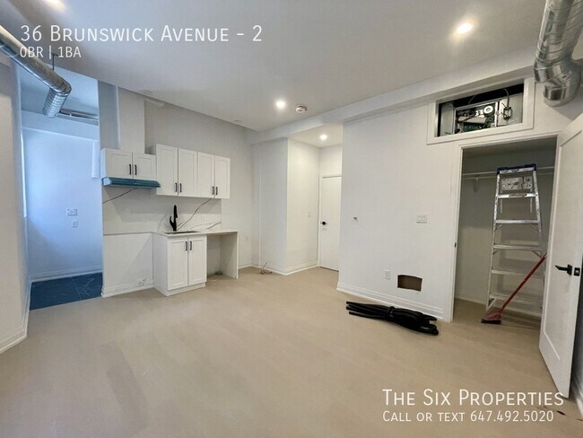 Photo du bâtiment - Brand New Bachelor Apartment in the Heart of Downtown