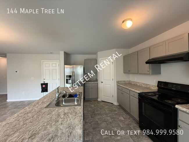 Foto del edificio - 144 Maple Tree Ln