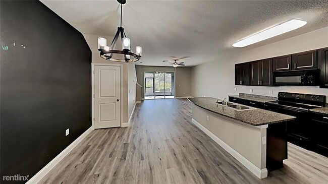 Building Photo - 3 br, 2.5 bath Townhome - 8980 Indigo Trai...