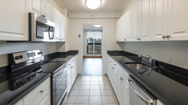 Kitchen with Stainless Steel Appliances - The Towers at Longfellow