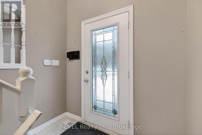 Building Photo - 6166 Wildrose Crescent