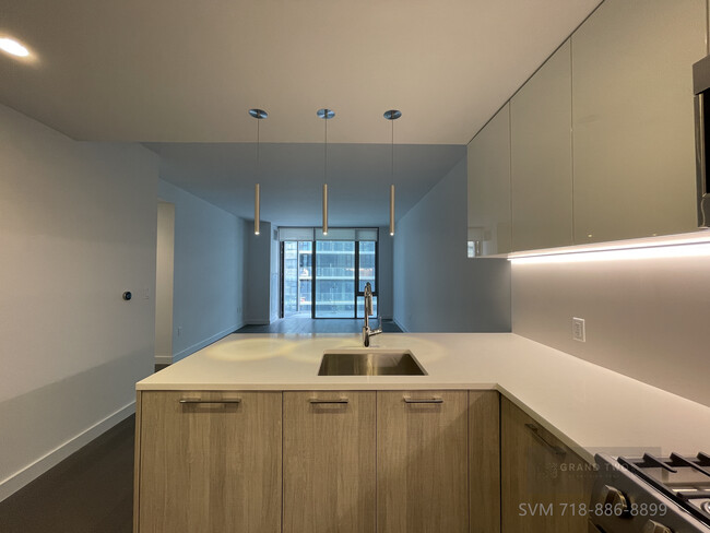 kitchen counter top and largest living room - 13103 40th Rd