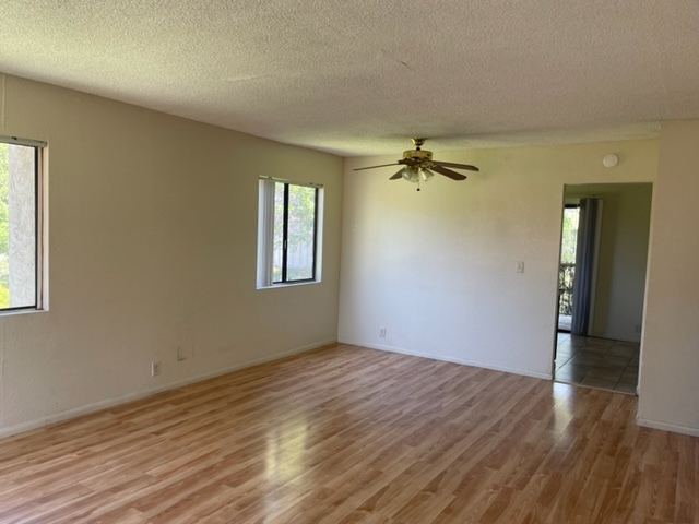 Living room into kitchen - 104 Avenida Las Brisas