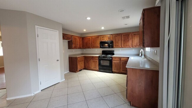 Building Photo - 3 br, 2.5 bath House - 8125 Ribbon Edge St