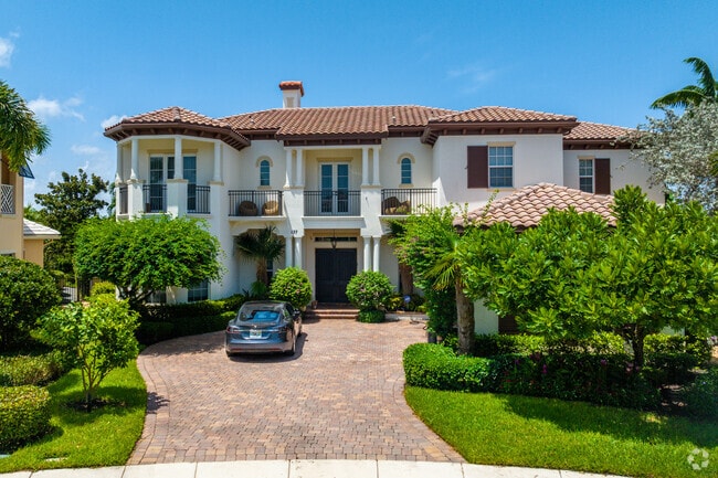 This Mediterranean style home is found in the Estates section of Botanica.