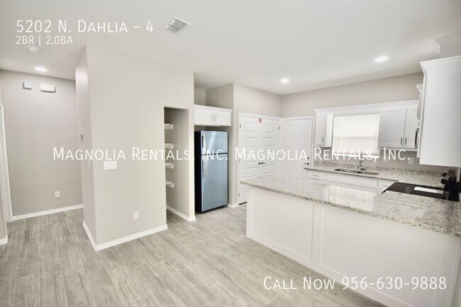 Building Photo - 5202 N. Dahlia-4