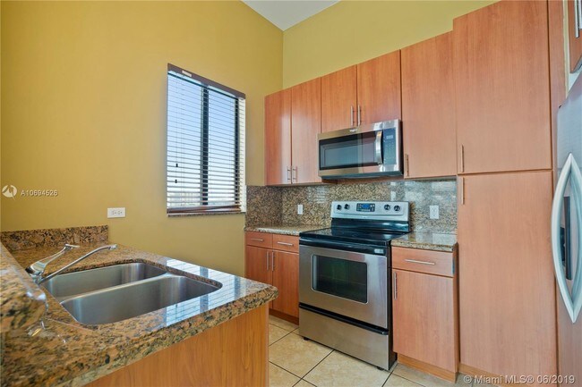 Building Photo - 1690 SW 27th Ave
