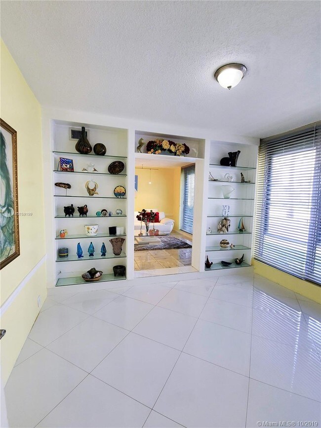 Building Photo - 10210 Collins Ave