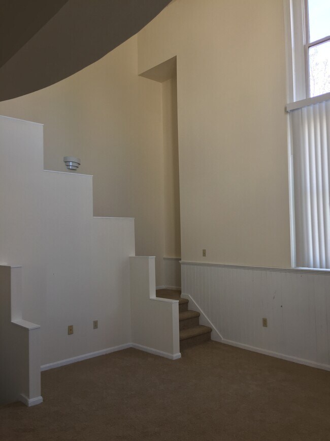 Living room and stairs to loft bedroom - 319 Wood St