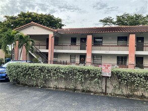 Building Photo - 10825 Royal Palm Blvd