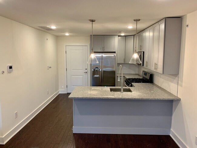 Foto del edificio - Stunning 2-Bed Condo with Private Roof Deck in Norris Square! Available mid-July!
