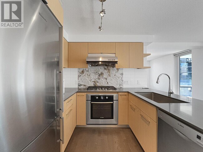 Photo du bâtiment - 7979-7979 Firbridge Way