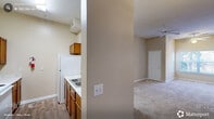 Located at 820 Martin Luther King Jr Pkwy in Durham, NC, this one-bedroom, one-bathroom residence offers a well-organized single-floor layout designed for comfortable everyday living. The open-concept area seamlessly combines the living room, dining room, and kitchen, creating a cohesive and functional shared space. The kitchen features warm wood-toned cabinetry, a double sink with light countertops, and white appliances, with durable hard-surface flooring underfoot. The living area is generously proportioned, highlighted by notably high ceilings and ceiling fans that enhance airflow and openness. Soft carpeting and neutral beige walls create a warm, inviting ambiance, while a window at the far end fills the room with natural light and views of the surrounding greenery. The bedroom is a comfortable, private retreat with plush carpeting, high ceilings, and a window that brings in natural light. Two closets provide ample storage throughout the unit. The bathroom is cleanly appointed with wood-look flooring, a vanity with warm cabinetry, and a tub-shower combination. A utility room and hallway round out the layout, adding practical functionality. The overall design is straightforward, neutral, and move-in ready.