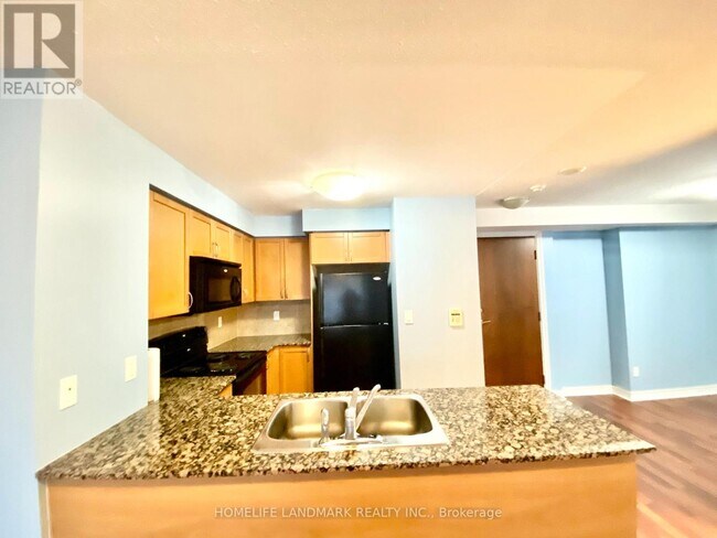 Photo du bâtiment - 310 Burnhamthorpe Rd W