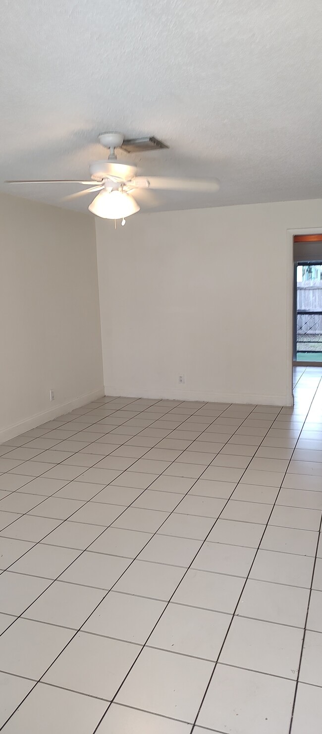 Welcome home! Tile floor, ceiling fan and light throughout - 12126 Gibbs Rd