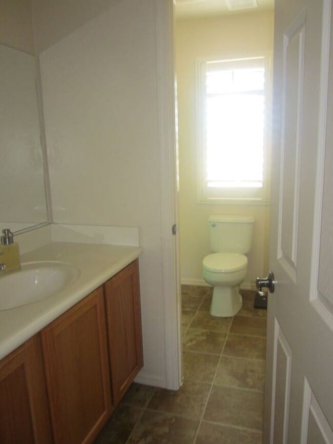 Building Photo - Adorable 2 story patio style with three spacious bedrooms and two full baths upstairs