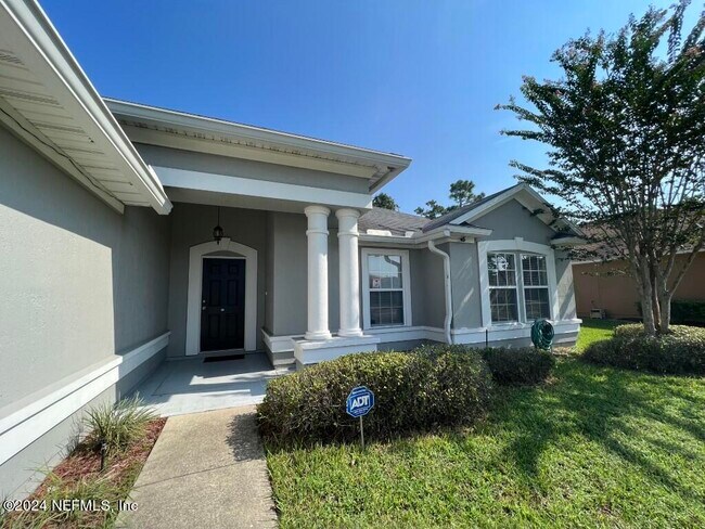Building Photo - 11335 Justin Oaks Dr N