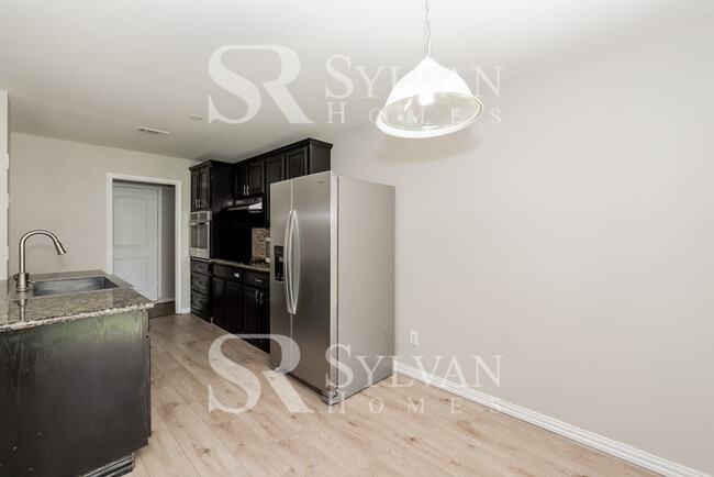 Building Photo - Turn the key. Enter. Smile. Repeat every day!