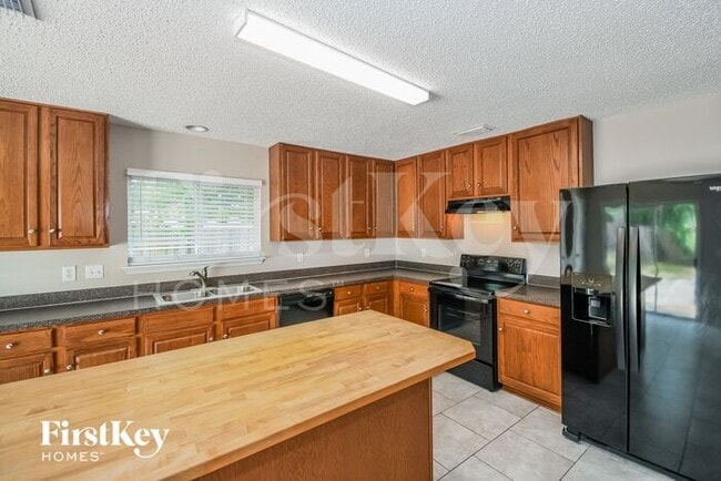 Building Photo - 11293 Martin Lakes Dr N
