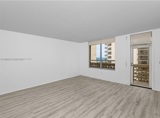 Building Photo - 10185 Collins Ave