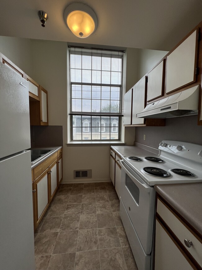 Unit 211 Kitchen - Woodlayne Court Apartments
