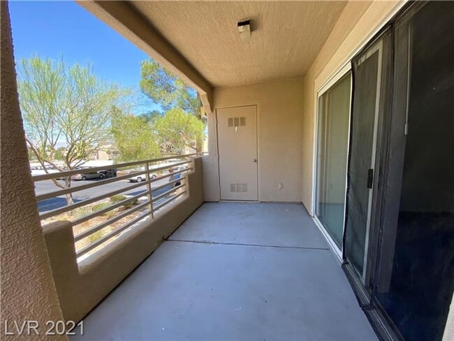 Building Photo - Charming 1-Bedroom Condo in Gated 89128 Co...