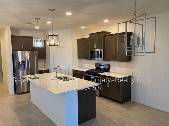 Building Photo - 10677 W Harrigan Dr