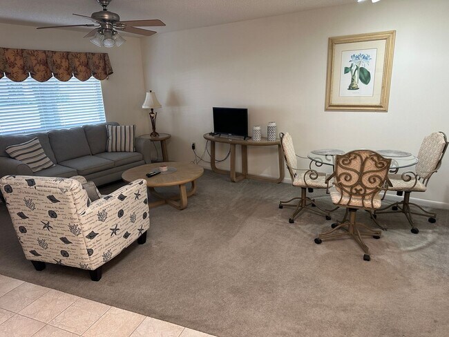 Building Photo - Experience Maintenance-Free 55+ Living at The Cove at Tavares Village!