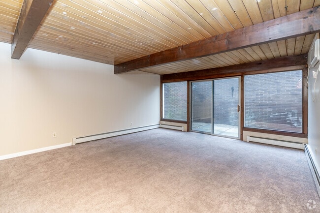 2BR,1BA - 1093SF - Living Room - Tallmadge Pointe