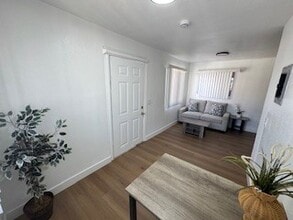 Building Photo - 8901 1/2 Holmes Ave