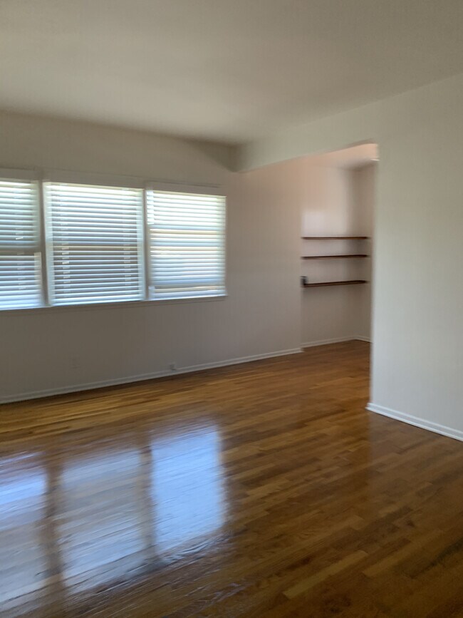 Living room. New Blinds. - 1515 Pontius Ave