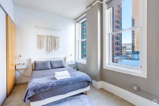 2BR, 1BA - 1105SF - Primary Bedroom - The Fleming Building