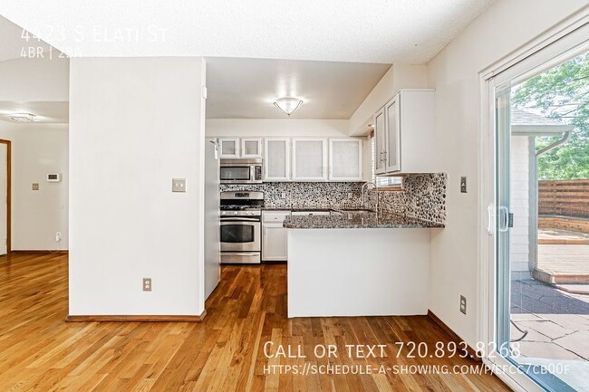 Building Photo - Serene Luxury: Spacious 4-Bedroom Sanctuar...