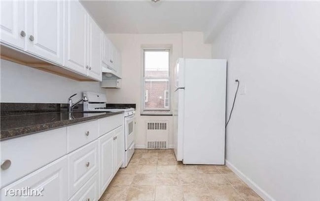 Building Photo - 39-50-50 52nd St