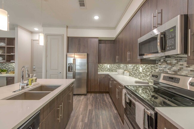Building Photo - Experience the Art of Fine Apartment Living!