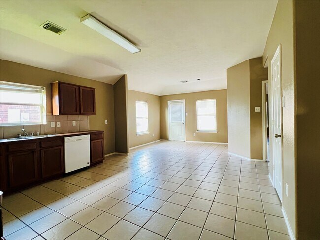 Foto del edificio - 7523 Blossommist Ln