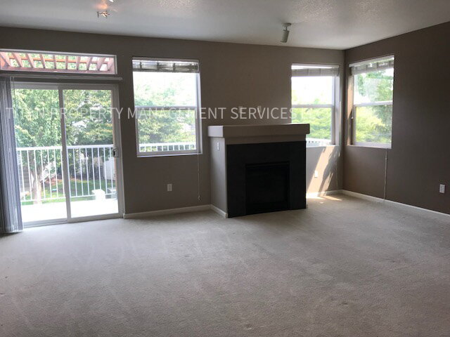 Building Photo - Beautiful Three Story Townhouse with Gas Fireplace, Balcony & 2-Car Garage