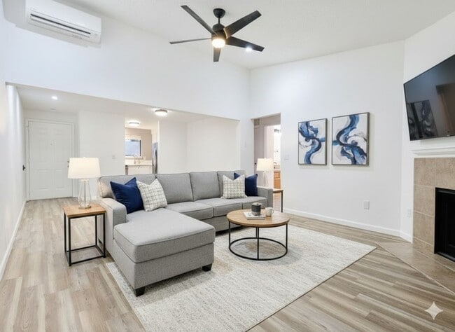 Building Photo - Stunning 2 Bedroom Condo with Fireplace, Modern Upgrades and Air Conditioning!