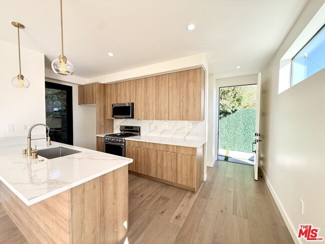 Building Photo - 10475 W Olympic Blvd