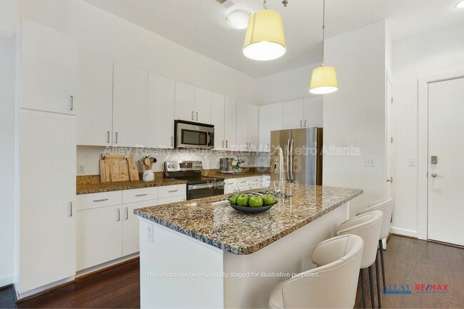 Photo - 711 Cosmopolitan Dr NE Apartment