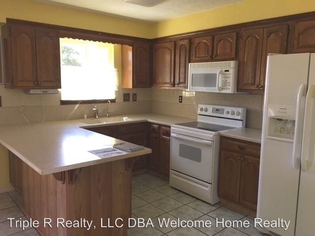 Building Photo - 3 br, 2 bath House - 1208 Desert Dawn