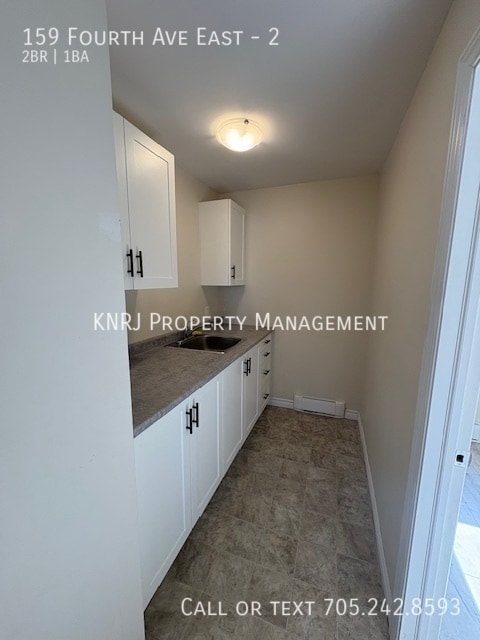Building Photo - Second Floor Two Bedroom Apartment