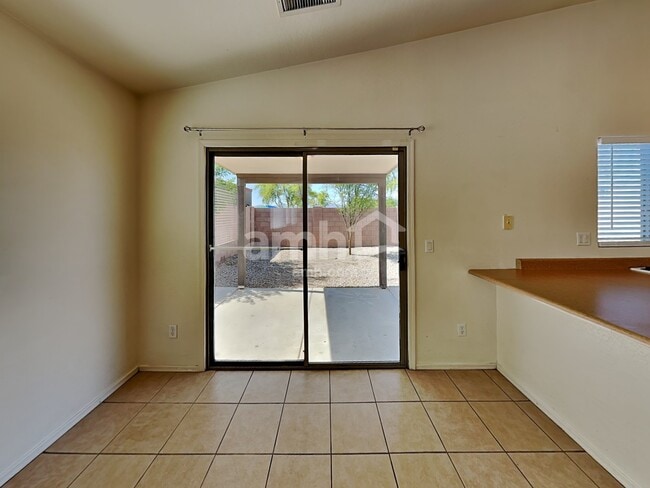 Building Photo - 10781 W Del Rio Ln