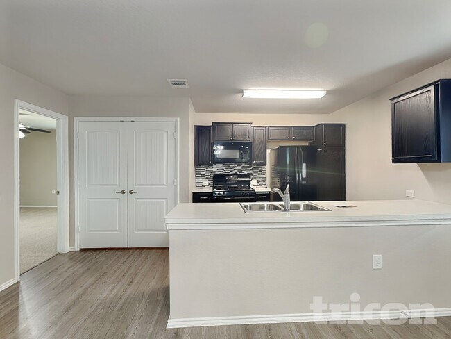 Building Photo - 7022 Cozy Run