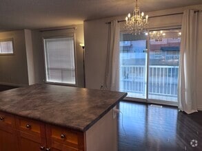 Building Photo - 114-12050 17 Av SW
