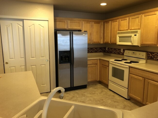 Photo - 18818 E 58th Ave Townhome