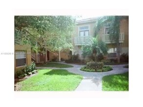 Building Photo - 4879 Via Palm Lakes