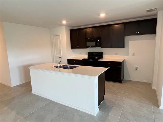 Foto del edificio - 5521 Rockrose Ln