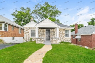 Building Photo - 6937 Glenmore Ave
