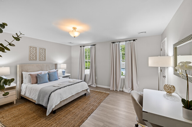 Tastefully appointed bedrooms - 180 S Pier Rd